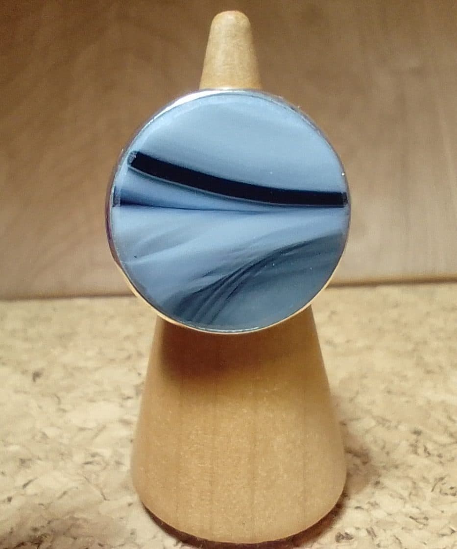 A stained-glass ring in blue and white hand-blown glass