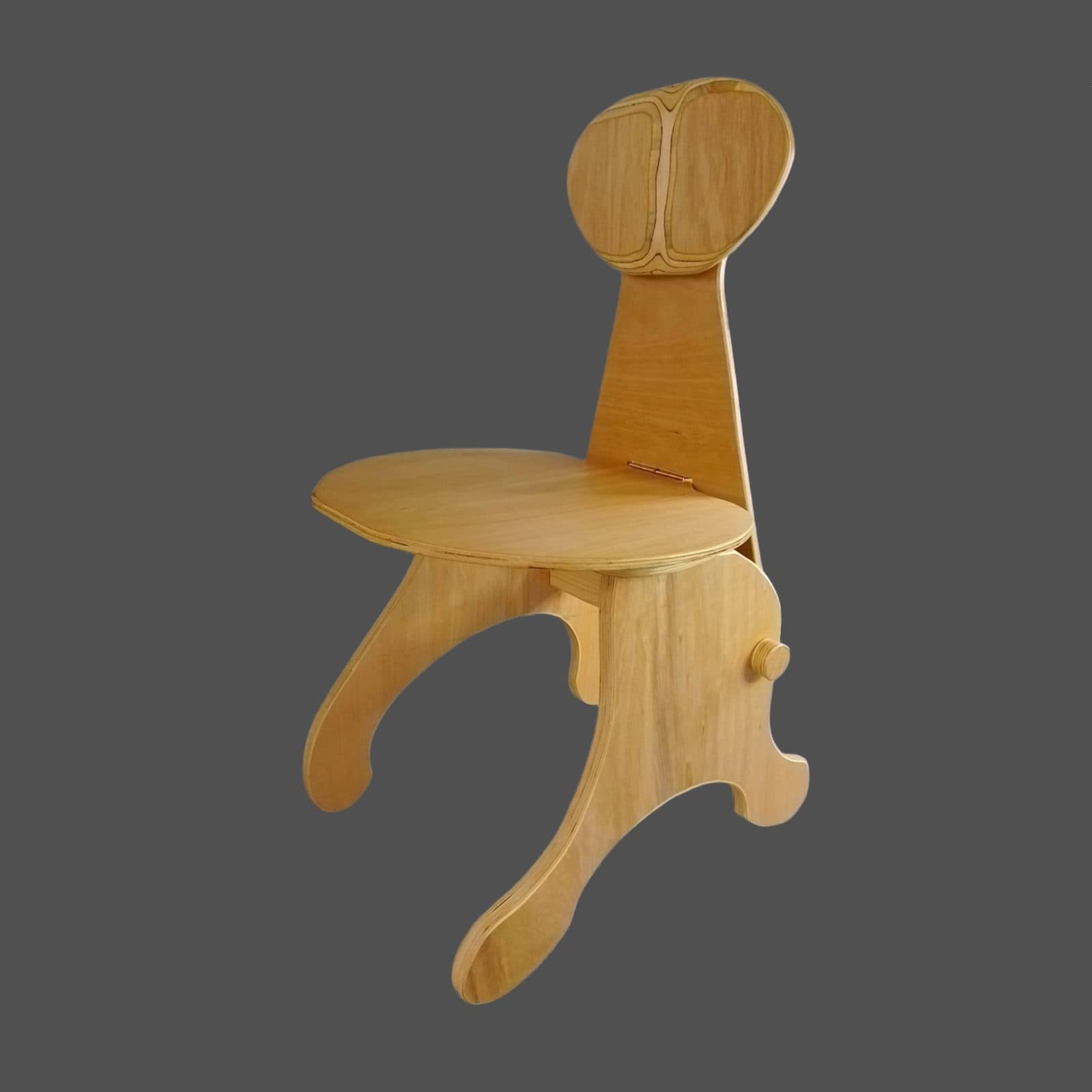 A hand-carved wooden chair with organic, almost animal-like legs